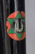 Urania-Logo auf dem Sattelrohr eines Anfang/Mitte der 1950er Jahre aufgearbeiteten Fahrrades.
