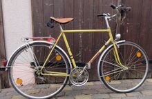 Weitgehend original erhalten. Mit Abstandhalter am Gepäckträger als Zubehör.