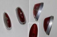 Zeitraum: 50er Jahre Verwendung: Zubehörteil Material: Aluminium, Kunststoff Farben/Varianten: Aluminium (blank) Bemerkungen: El-Me Symbol innen auf der Leuchtenkappe; mit oranger Kappe als Bremslicht beim STOPFIX mitgeliefert