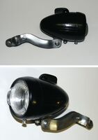 Zeitraum: 195? bis 195? Verwendung: Zubehörteil Material: Duroplast, Glas Bemerkungen: großes Logo mittig auf Streuscheibe sowie Kennzeichnung "Germany" am unteren Rand; mit Fahr- und Bodenlicht