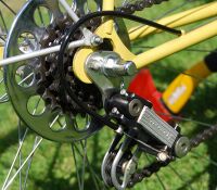 Zeitraum: 198? - 1990 Verwendung: Diamant-Rennräder und -Rennsporträder Material: Aluminium, Kunststoff Bemerkungen: letzte Ausführung; Kettenleitrollen mit Aussparungen