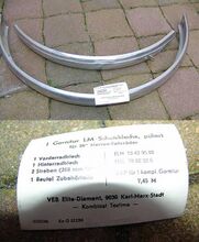 Zeitraum: 1960er bis 1980er Jahre Hersteller: Diamant Verwendung: Zubehörteil Material: Aluminiumblech Größen: hier: 26 Zoll Überstand des Vorderrad-Schutzleches: lang Farben/Varianten: Aluminium blank Profil: gewölbt Bemerkungen: Abschluss mit "Nase"