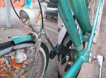 Laufräder, Beleuchtung und andere Details sind keine DDR-Produkte. Das Kettenblatt vermutlich DDR, die Herkunft des Tretlagers lässt sich nicht sicher zuordnen.