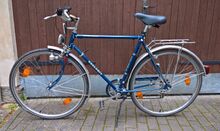 Modell 214 als Exportversion vrmtl. für die Bundesrepublik Deutschland, Marke Exclusiv, um 1990. Es findet sich kein Hinweis auf den Hersteller des Fahrrades. Griffe, Frontreflektor, Ständer, Sattel und Fahrradcomputer sind nicht original. Weiße Linierung offensichtlich nachträglich aufgebracht oder ursprüngliche Linierung nachgezogen (siehe vorstehendes Rad).