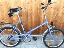 1990: Ein Klapprad mit dem Dekor, wie es in der ersten Jahreshälfte 1990 verwendet wurde. Auch die Lackierung in lila ist typisch für die Zeit Anfang der 1990er Jahre.