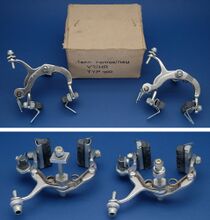 Rasant-Seitenzugbremse (Rennausführung - TYPE 700) Zeitraum: 198x bis 198x(?) Verwendung: Zubehörteil; eventuell Diamant Modell 35 715 "Rubin" Material: Aluminium Bemerkungen: mit Seilzugentlastern; Mittelstück sechseckig; Abstandshalter zur Montage nötig; Bremsschenkel ohne Beschriftung; Bremsgummis mit 4 Kerben