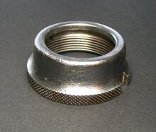 Abschlussmutter E Zeitraum: 1960er Jahre, bis mind. 1967 Material: Stahl, verchromt