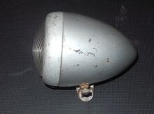 Scheinwerfer Zeitraum: Verwendung: vrmtl. Sport-, Touren- und Tourensporträder von Diamant Material: Stahlblech, Aluminium, Glas Ø Lichtaustritt: 60 mm Bekannte Farben: silber Bemerkungen: Möglicherweise Typ "FSW 60/85"?