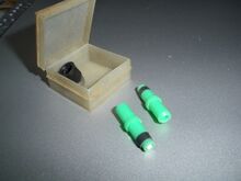 Dunlop-Ventileinsatz Zeitraum: 80er Jahre Hersteller: ?? Material: Thermoplast Bemerkungen: Bekannte Farben: transparent, grün, orange. Mäßige Qualität.